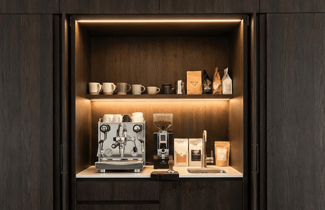Appliance Garage Coffee Station A custom built coffee station hidden behind pocket doors in an appliance garage