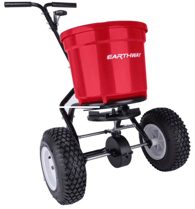 Earthway 2150 Commercial Broadcast Spreader featuring large 9-inch pneumatic tires and a heavy-duty steel frame, the top heavy-duty pick for 2026.