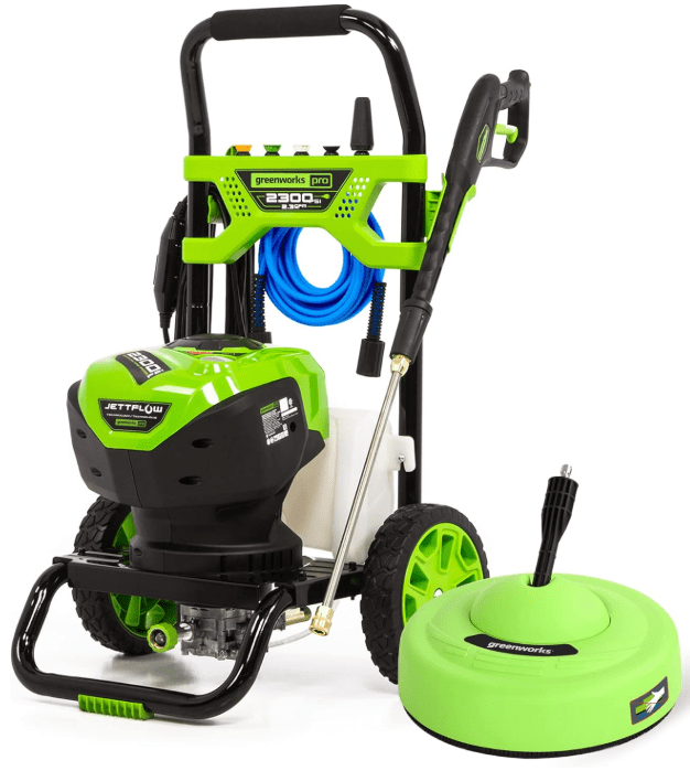 The Greenworks Pro 2300 Max PSI brushless electric pressure washer being used with its included surface cleaner attachment on a concrete driveway