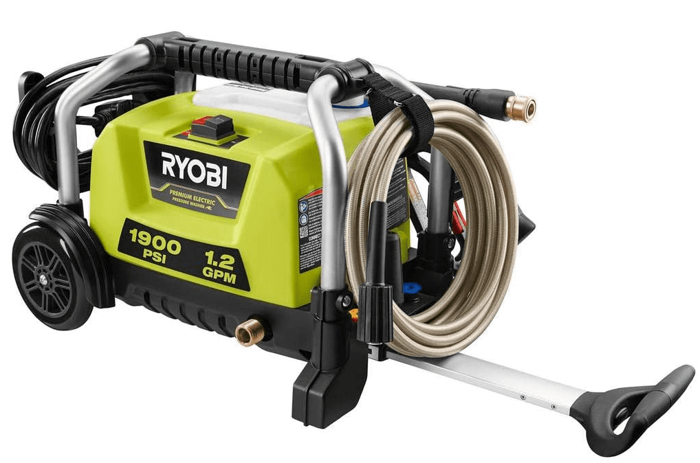 A user easily carrying the lightweight Ryobi 1,900 PSI portable electric pressure washer by its handle. Rated as the best budget pick for small jobs.