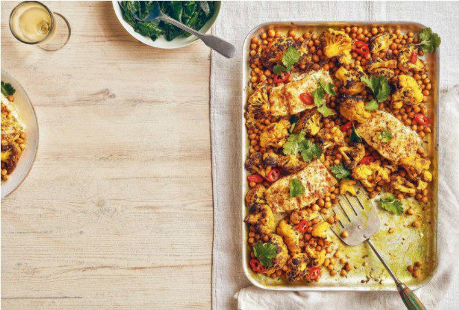 Curried butter-baked cod with cauliflower & chickpeas