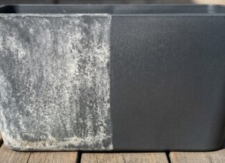 How to Remove Hard Water Stains From Outdoor Plastic (Furniture & Planters) A dynamic side-by-side visual comparison of a dark plastic planter heavily covered in white hard water stains on the left, and a clean, dark, restored surface on the right, demonstrated outdoors in the sunlight.