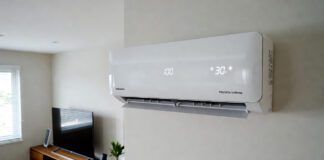 Power Efficient Air Conditioner 2026: Real Tests & Low Power Models Modern power efficient inverter air conditioner mounted in a living room