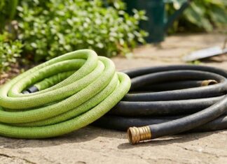 Expandable Hose vs. Rubber Hose: Which is Actually Better? (2026) A lightweight green expandable garden hose placed next to a heavy black traditional rubber hose on a stone patio
