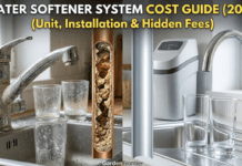 Water Softener System Cost Guide (2026): Unit, Installation & Hidden Fees Homeowner reviewing a plumber's installation bill next to a new salt-based water softener system in a basement
