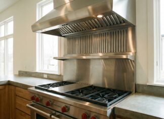 1000 CFM Range Hoods and 1200 CFM Vent Hoods 2026: My Real-World DIY Reality Check A modern pro-style 1000 CFM stainless steel range hood installed over a large gas cooktop in a residential kitchen.