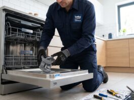 Beko Dishwasher Review & Troubleshooting Guide (2026) A technician repairing a Beko dishwasher to fix draining issues and E01 error codes.