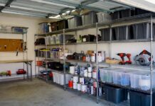 Best Heavy Duty Shelving for Garages & Warehouses (2026) A perfectly organized garage featuring a chrome heavy duty wire storage shelving unit holding tools and bins.