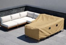 Best Outdoor Patio Furniture Covers (Why You Don’t Need Custom) A high quality waterproof patio furniture cover protecting an outdoor modular sectional on a sunny deck.