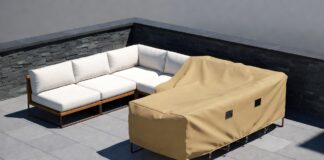 Best Outdoor Patio Furniture Covers (Why You Don’t Need Custom) A high quality waterproof patio furniture cover protecting an outdoor modular sectional on a sunny deck.