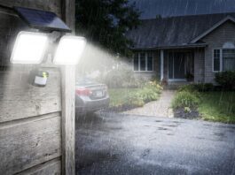 Best Solar Flood Lights: What to Look for Before Buying Solar flood lights installed above a garage and lighting a driveway at night