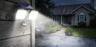 Best Solar Flood Lights: What to Look for Before Buying Solar flood lights installed above a garage and lighting a driveway at night