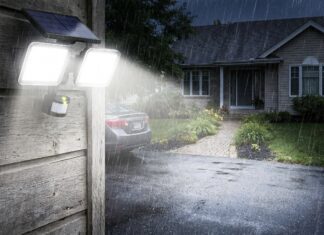 Best Solar Flood Lights: What to Look for Before Buying Solar flood lights installed above a garage and lighting a driveway at night
