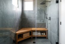 Corner Shower Bench: Best Types, Sizes, Materials & Buying Tips A teak corner shower bench placed inside a modern walk-in shower