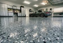 How Much Does Epoxy Flooring Cost? (2026 DIY Guide) A clean, shiny, professional-looking epoxy garage floor