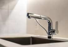 Kitchen Best Sink Materials & Faucets: Ultimate Guide (2026) The kitchen best sink setup featuring a modern workstation basin and a pull-out spray faucet.