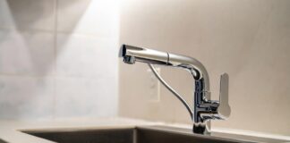 Kitchen Best Sink Materials & Faucets: Ultimate Guide (2026) The kitchen best sink setup featuring a modern workstation basin and a pull-out spray faucet.