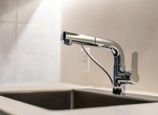 Kitchen Best Sink Materials & Faucets: Ultimate Guide (2026) The kitchen best sink setup featuring a modern workstation basin and a pull-out spray faucet.