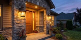 Solar Outdoor Wall Lanterns: Best Types, Features & Buying Tips Solar outdoor wall lanterns mounted beside a front door at night