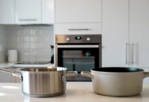Stainless Steel vs Ceramic Cookware: Which Is Better for Real Cooking? Stainless steel vs ceramic cookware comparison in modern kitchen