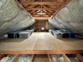 Attic Flooring Options: Best Materials, Costs & DIY Tips Raised attic flooring installed over insulation for safe home storage