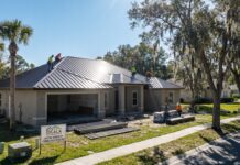 Metal Roofing in Ocala, FL: Cost, Permits, Pros, Cons & When It Makes Sense A metal roof installation on a Florida home in Ocala with standing seam panels