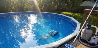 Best Above Ground Pool Vacuum: Robotic, Battery & Manual Picks Above ground pool vacuum cleaning a vinyl liner pool with a robotic pool cleaner and manual vacuum nearby