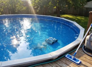 Best Above Ground Pool Vacuum: Robotic, Battery & Manual Picks Above ground pool vacuum cleaning a vinyl liner pool with a robotic pool cleaner and manual vacuum nearby