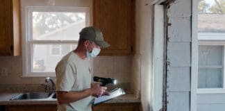 Exterminator Prices: Average Pest Control Costs by Pest Type Pest control technician inspecting a residential kitchen and exterior wall for common household pests