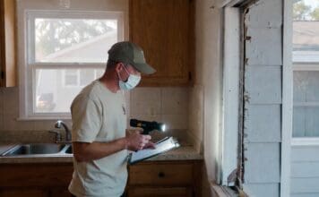 Exterminator Prices: Average Pest Control Costs by Pest Type Pest control technician inspecting a residential kitchen and exterior wall for common household pests
