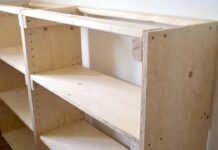 How to Build a Bookshelf: DIY Plans, Cut List & Tools Beginner DIY bookshelf project with plywood shelves, clamps, drill, sander, and wood boards in a workshop