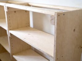 How to Build a Bookshelf: DIY Plans, Cut List & Tools Beginner DIY bookshelf project with plywood shelves, clamps, drill, sander, and wood boards in a workshop