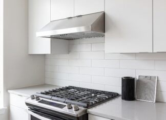 Best 30 Inch Ductless Range Hood: Top Picks & Buying Tips 30 inch ductless range hood installed under a cabinet above a stove in a modern kitchen