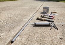 Best Concrete Crack Filler for Large Cracks: Backer Rod & Sealant Guide Large concrete crack filled with backer rod before applying concrete crack filler