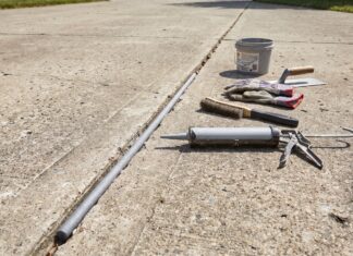 Best Concrete Crack Filler for Large Cracks: Backer Rod & Sealant Guide Large concrete crack filled with backer rod before applying concrete crack filler