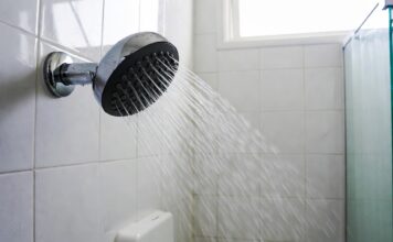 Best High Pressure Shower Head for Low Water Pressure: Fixed & Handheld Picks High pressure shower head spraying strong water in a modern bathroom shower