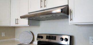 Best Range Hood for Apartment Kitchen: Ductless & No-Vent Options Ductless under-cabinet range hood installed above a stove in a small apartment kitchen