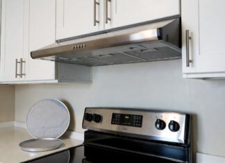 Best Range Hood for Apartment Kitchen: Ductless & No-Vent Options Ductless under-cabinet range hood installed above a stove in a small apartment kitchen