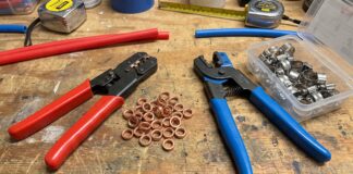 PEX Crimp vs Clamp: Which Connection Is Better? PEX crimp and clamp tools with copper crimp rings and stainless steel cinch clamps on a workbench