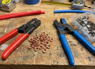 PEX Crimp vs Clamp: Which Connection Is Better? PEX crimp and clamp tools with copper crimp rings and stainless steel cinch clamps on a workbench