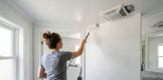 Mold Resistant Paint: Best Uses, Bathroom Tips & 7 Mistakes to Avoid Mold resistant paint being applied in a bathroom with clean walls, ceiling, and ventilation fan