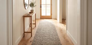 Entryway Runner Rug: Best Sizes, Materials & Hallway Ideas Entryway runner rug in a long hallway foyer with console table and plants