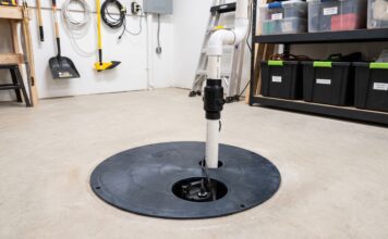 Sump Pump Cost: Installation, Replacement & 7 Price Mistakes to Avoid Basement sump pump installed in a sump basin with discharge pipe and check valve